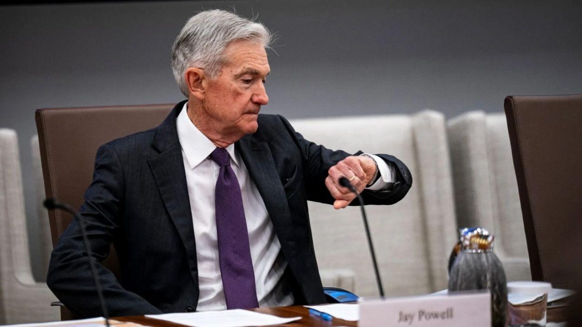 Powell Holds Rates Amid Dissent